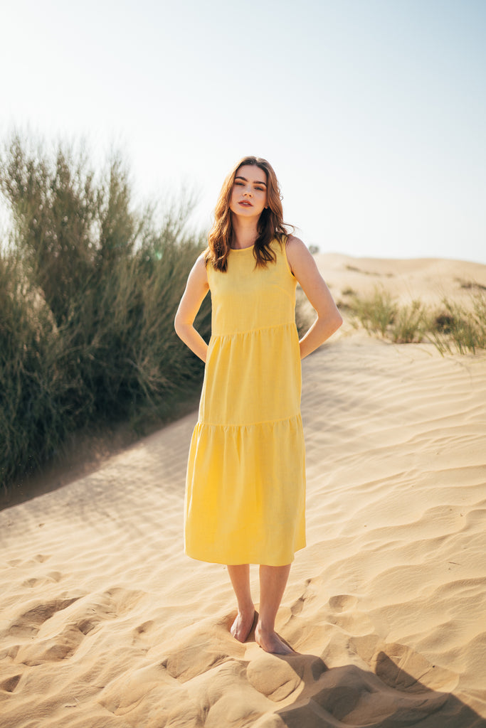 Multi tier, round neckline, sleeveless, long women's linen dress in yellow made by Anse Linen.