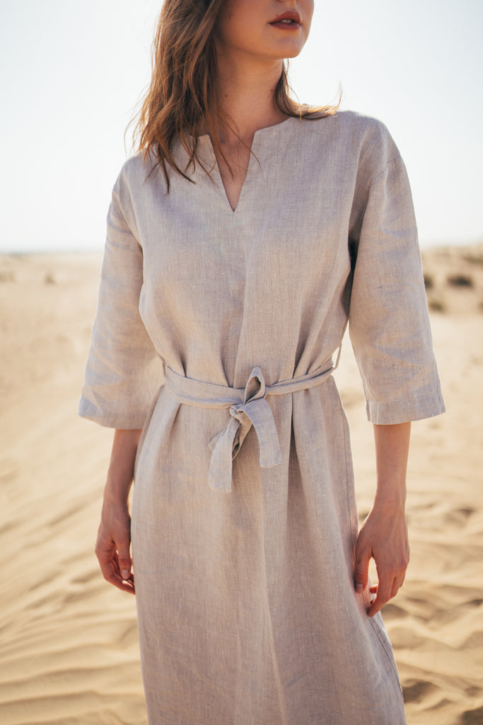 V neckline belted three quarter sleeve linen dress by womenswear brand Anse Linen.