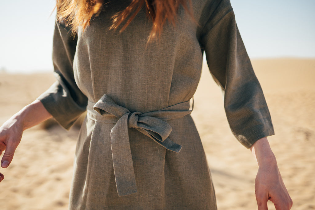 Long sleeve belted midi dress with v neckline made of pure linen.
