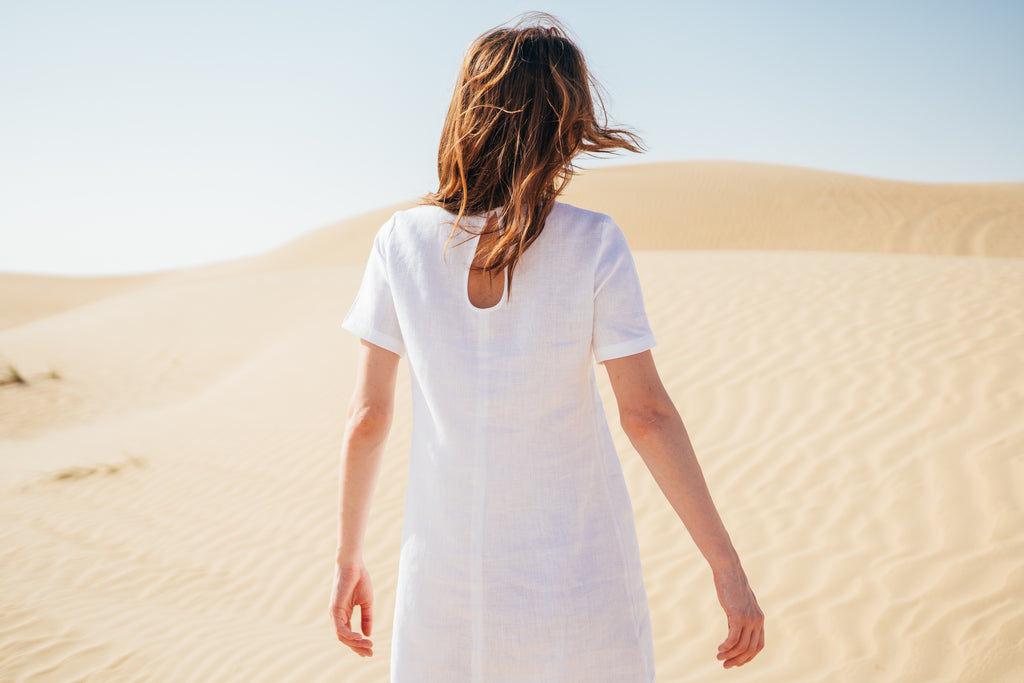 Short white beach dress made of 100% pure linen for women.