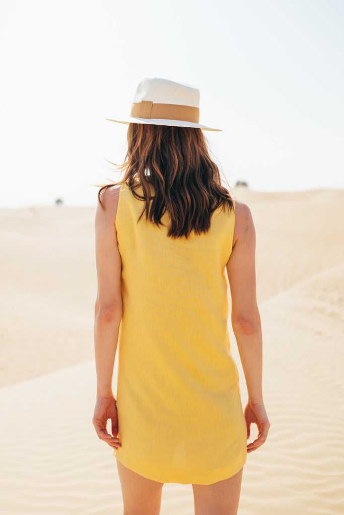 Pull on light summer dress in yellow linen by Anse Linen.